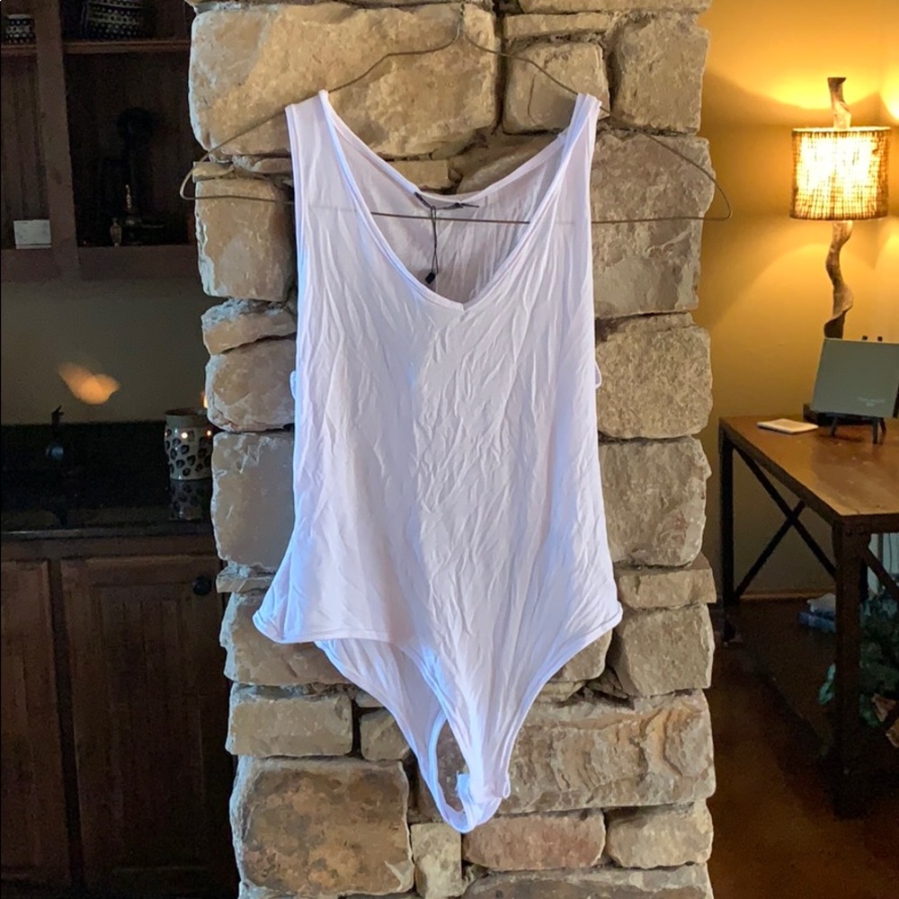 White stretchy soft low neck body suit